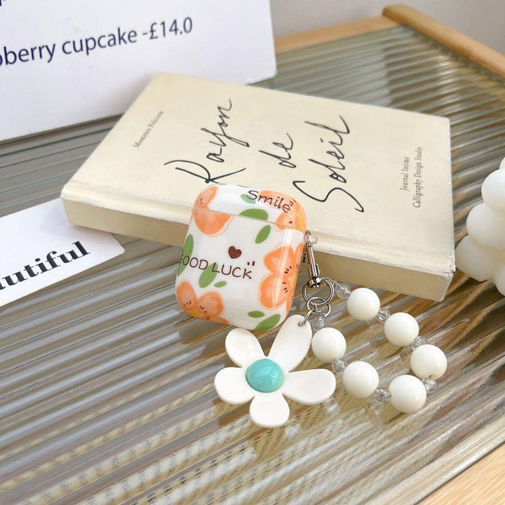 Charming Daisy Chain AirPods Case with Good Luck Charm